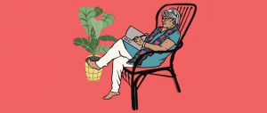 On a rust coloured background, an elderly woman is sitting on a rocking chair and writing in a notebook. Beside her is a plant.